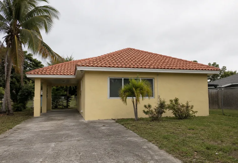 After: re-laid concrete barrel tile roof on the same Pompano Beach FL house