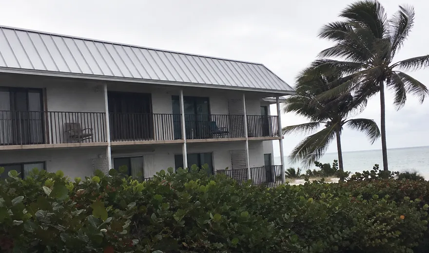 Roofing in Lauderdale-by-the-Sea FL, aluminium panels on an oceanfront property