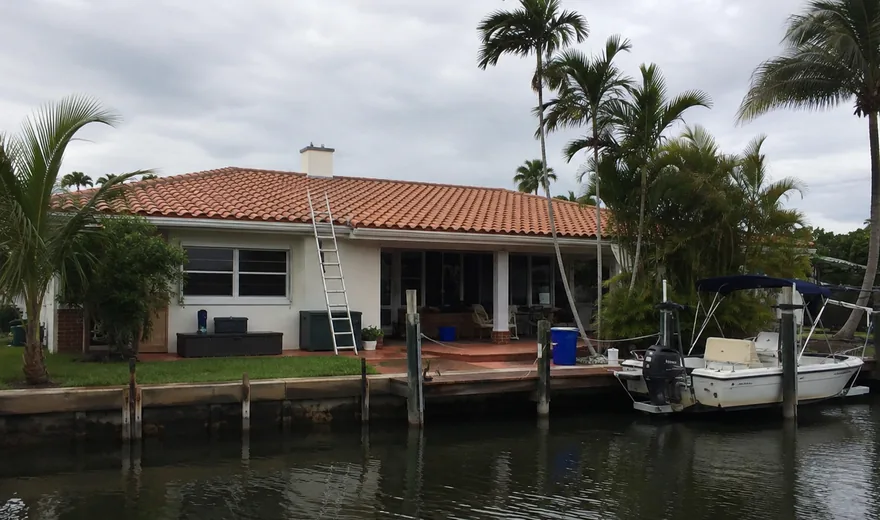 Roofing in Lighthouse Point FL on a canal-front tile roof