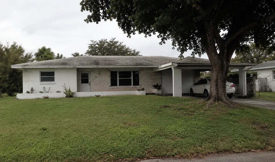 Roofing in Margate FL, low-slope roof on a 1960s ranch house