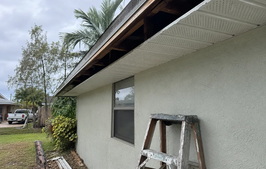 Soffit and fascia repair in Pompano Beach FL with new aluminium vented soffit